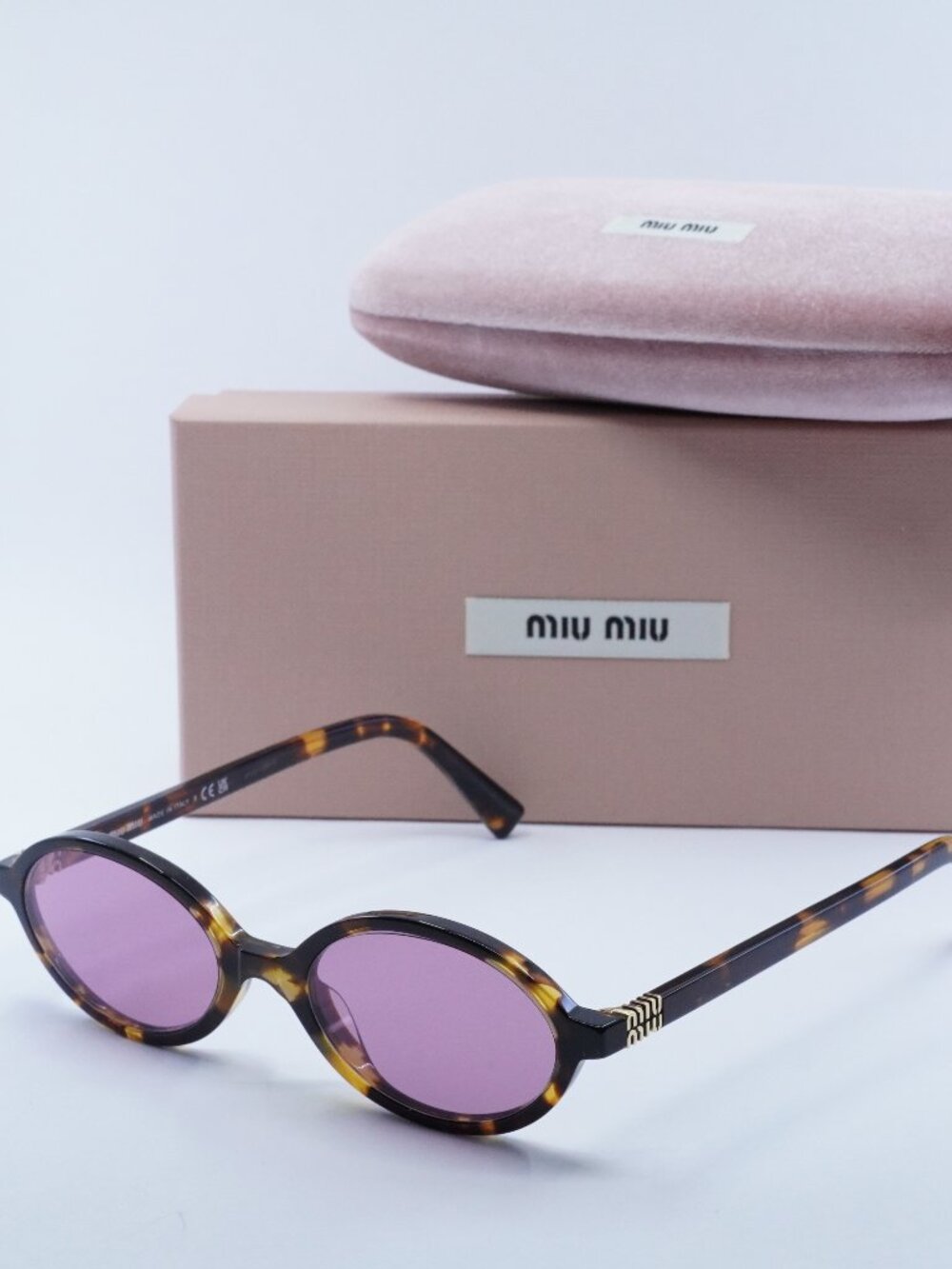 Miu Miu MU04ZS VAU50D Oval Sunglasses – Honey Havana\Bordeaux Mirrored